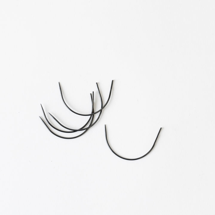 Curved Needles